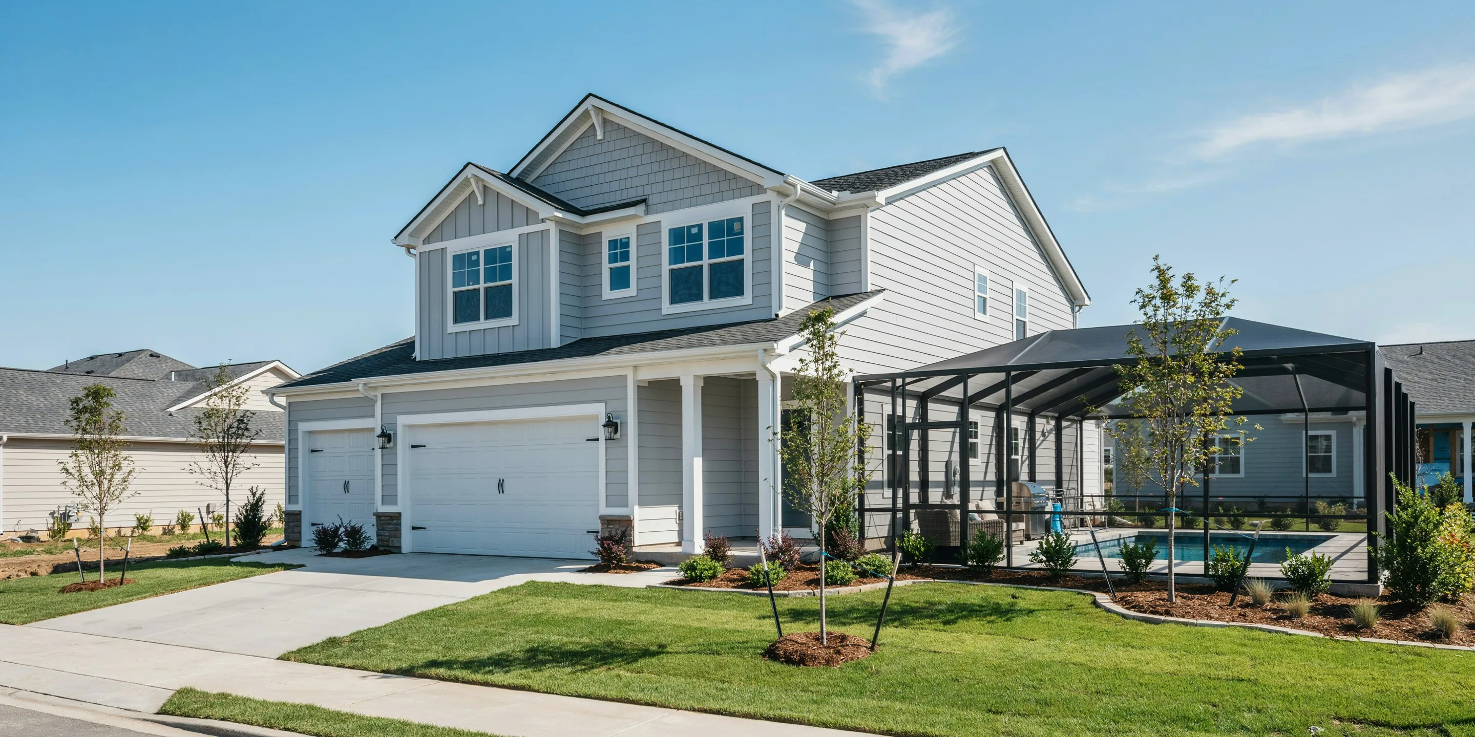 Newer home with a large pool cage in the Venetian Golf & River Club, North Venice, FL